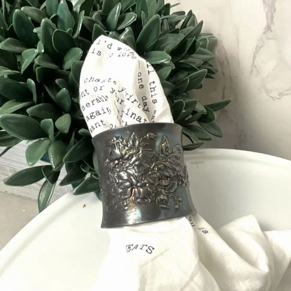Gorgeous antique silver plated napkin ring; embossed flowers
